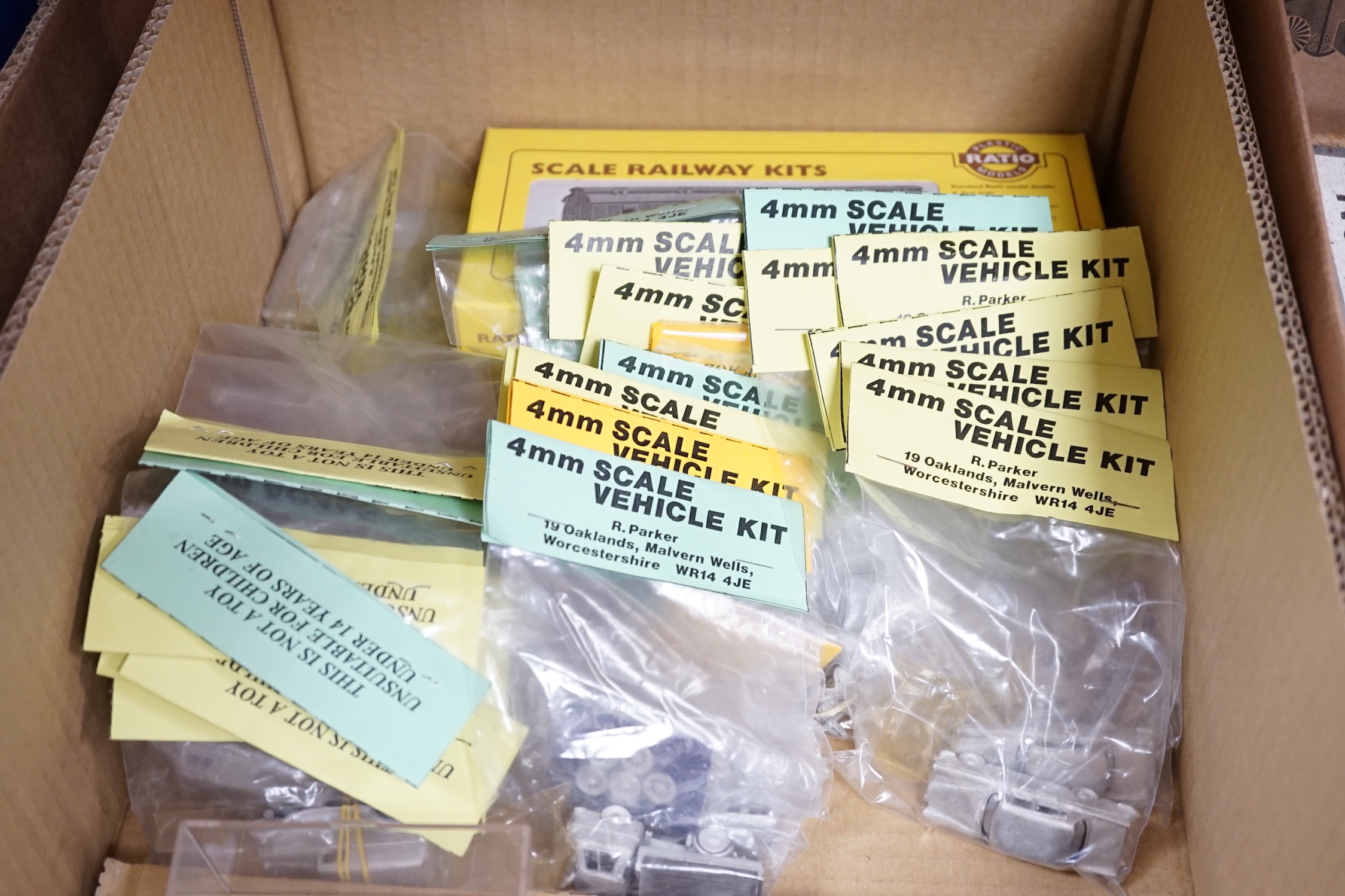 Forty 4mm, OO Gauge model railway unconstructed and packeted white metal kits, by Springside Models and R. Parker, including cars, commercial, vehicles, and motorcycles, together with two ratio kits for LMS clerestory co